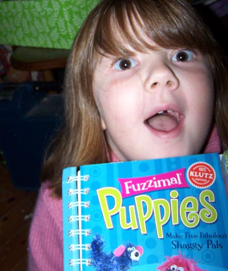 Emmy LOVES her Fuzzimals!