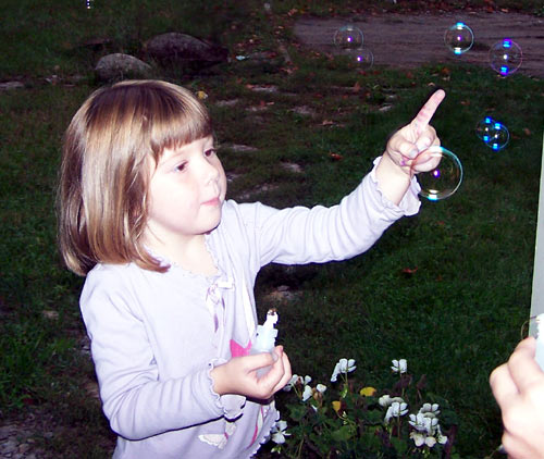 Emmy likes BURSTING them!