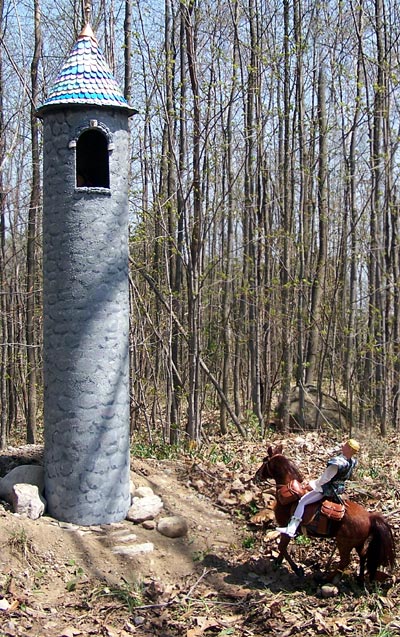 He approaches the tower...