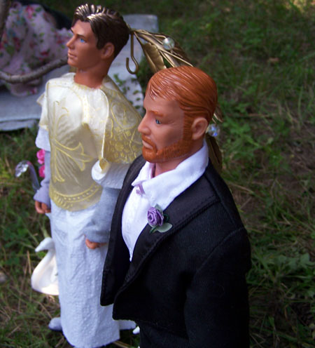 Father Francis supports the nervous groom...